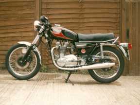 A very late T140 and possibly the worst bike I ever owned, notice the Ali barrel and the rear sets